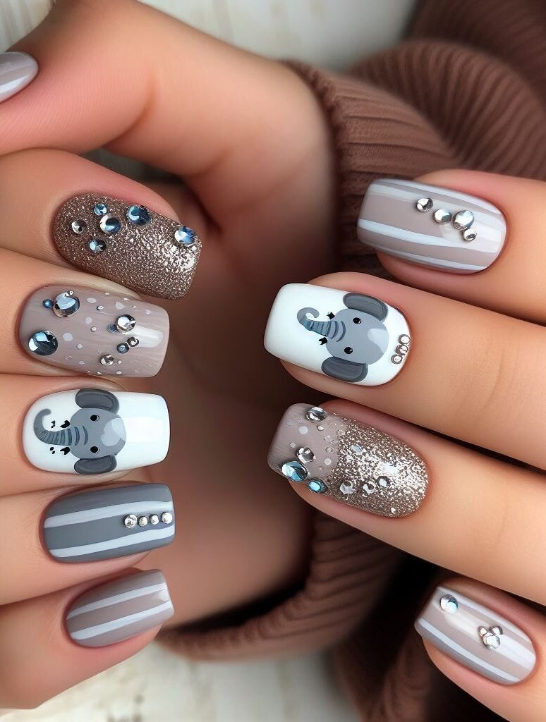 Blooms for baby elephants! Combine your love for elephants and florals with charming nail art featuring baby elephants adorned with delicate flowers for a sweet and elegant look.