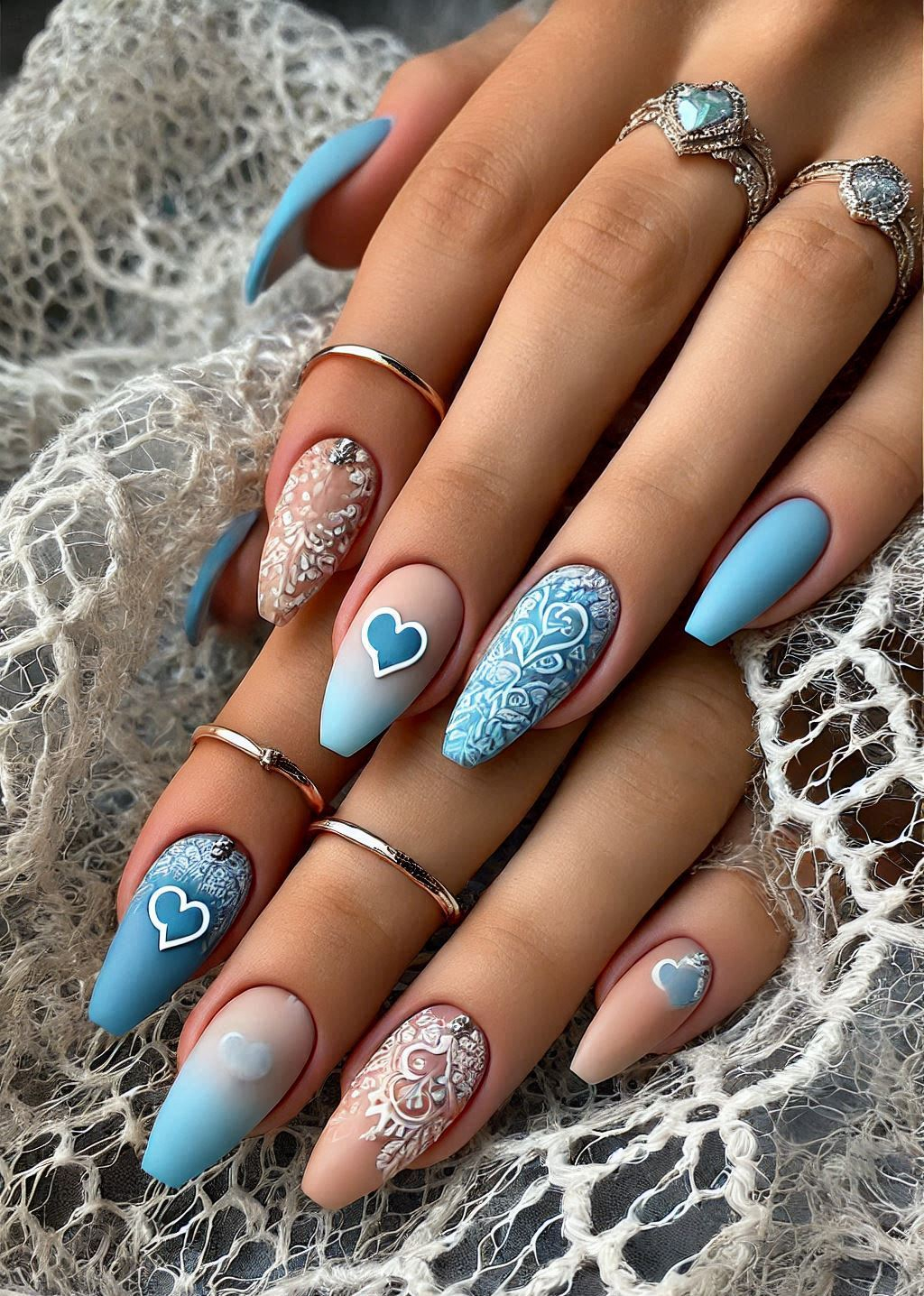 Dive into the dreamy world of blue and baby pink ombre nails. This sweet and serene blend is perfect for adding a touch of pastel magic to your fingertips.