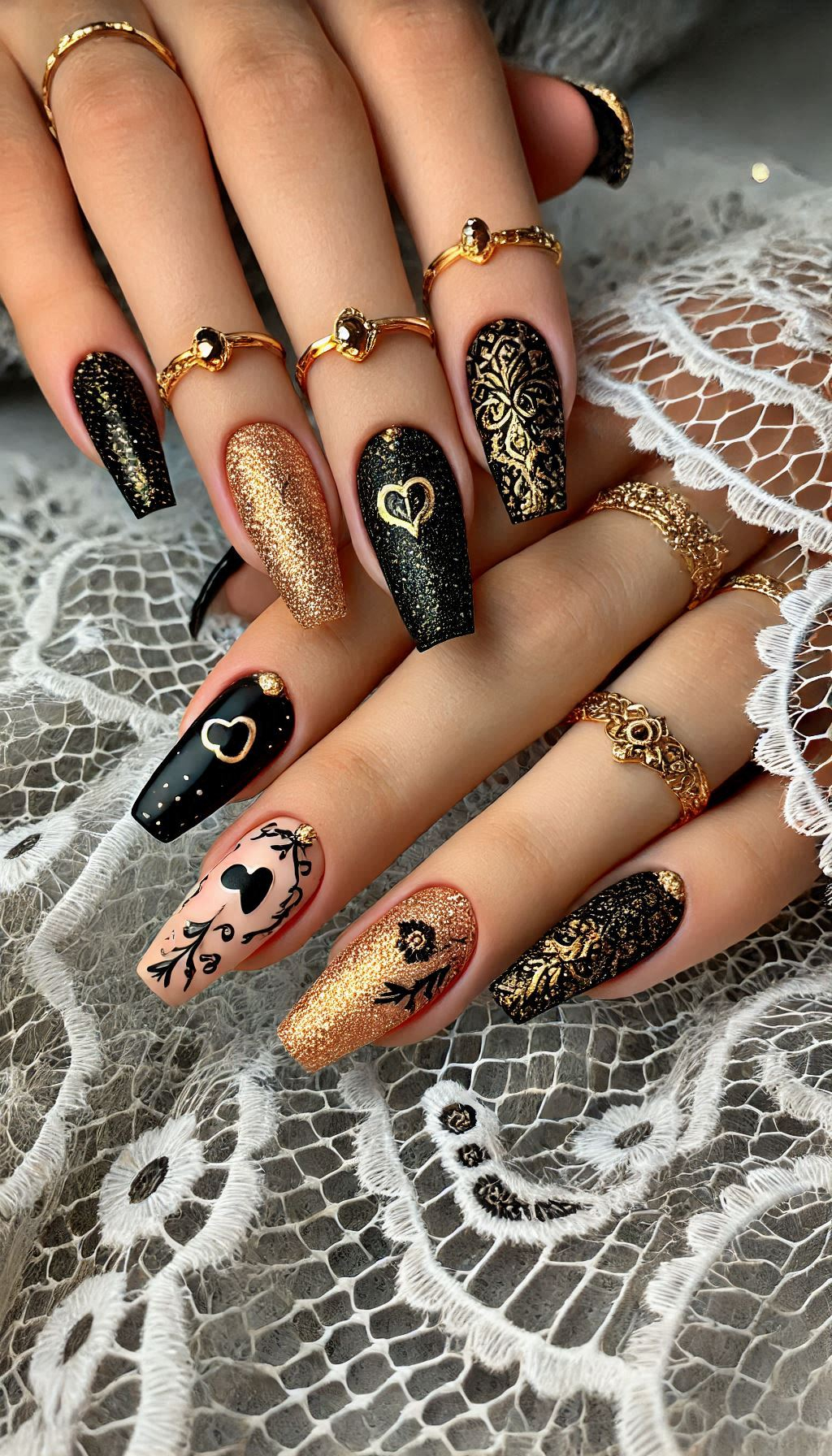 Mesmerizing Glitter Nail Art Ideas to Turn Heads | Pocoko Get ready to dazzle with black and golden glitter nails. Elegant, glamorous, and absolutely show-stopping!
